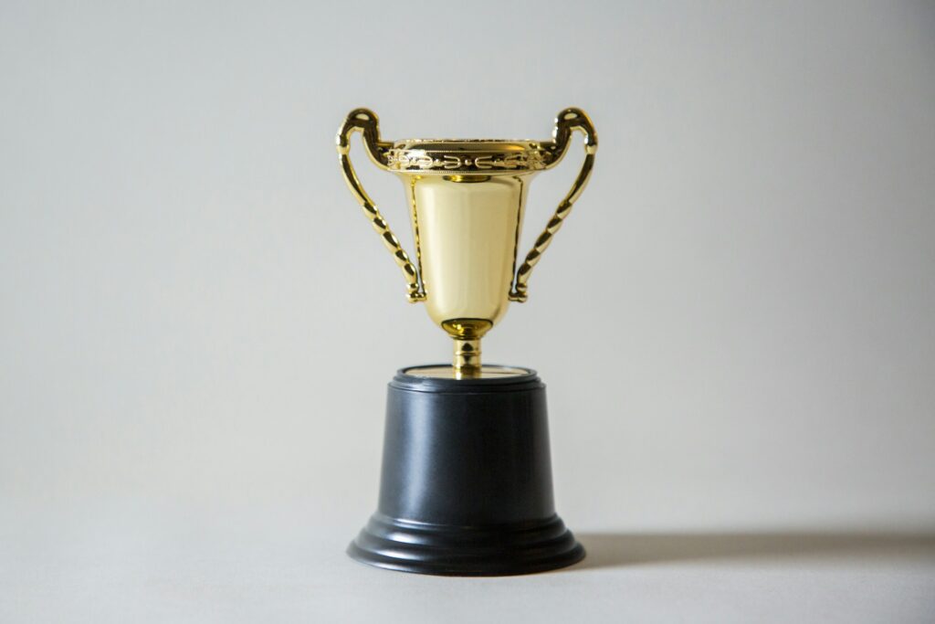 “Trophy representing how children can achieve mastery in multiplication through fun and effective strategies.”